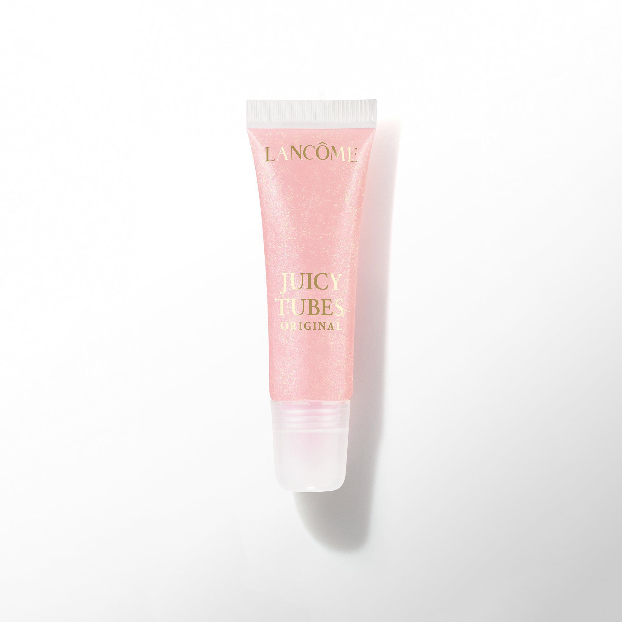 Un tub de luciu de buze Lancome Juicy Tubes Original, intr-o nuanță roz deschis, pal.