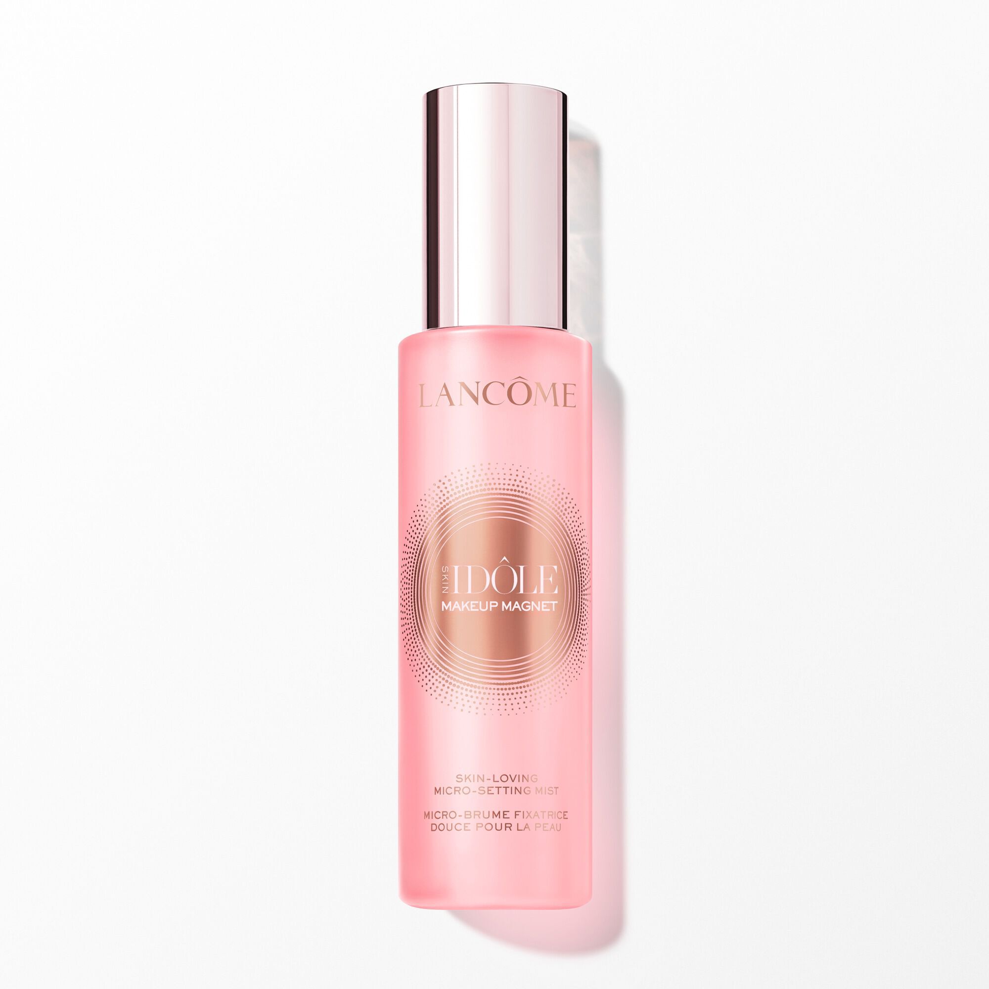 Sticlă roz de spray de fixare Lancome Idole Makeup Magnet.
