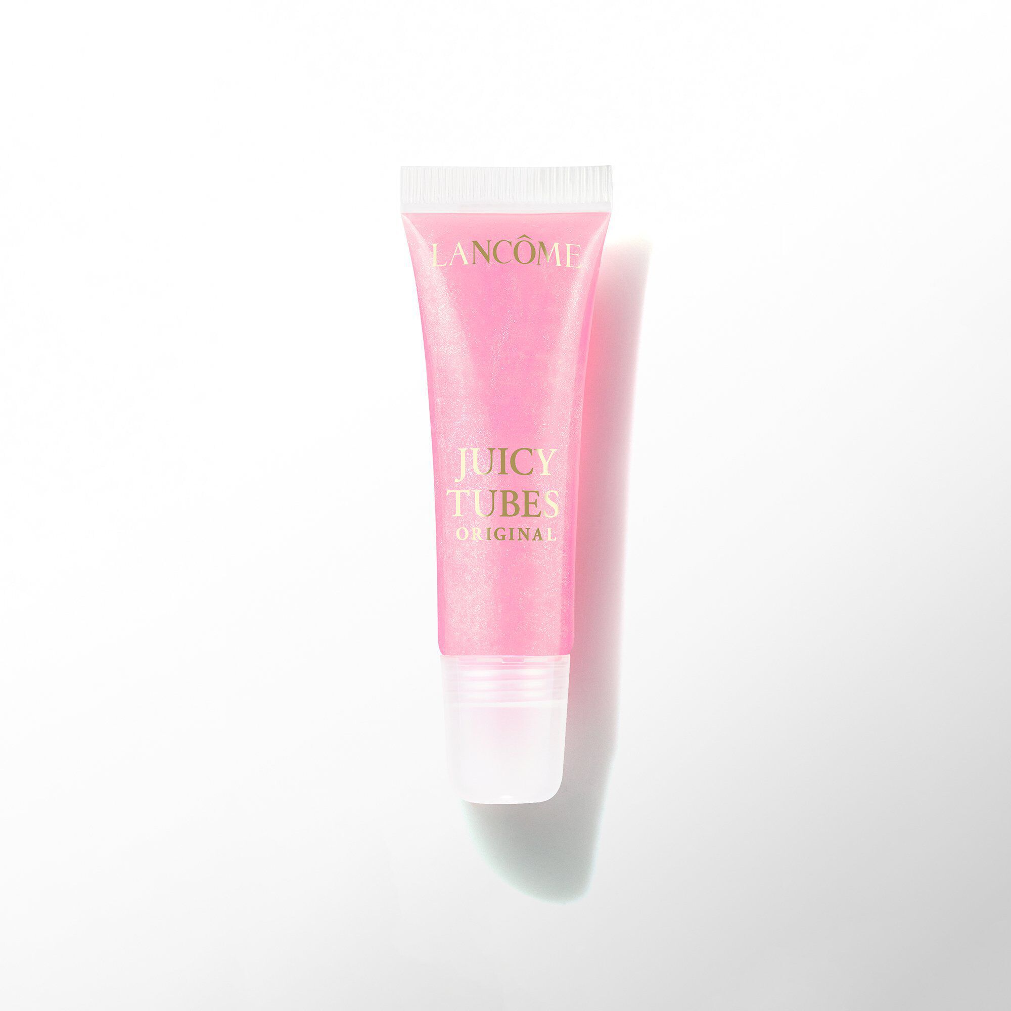 Un tub de luciu de buze Lancome Juicy Tubes Original intr-o nuanță roz aprins.