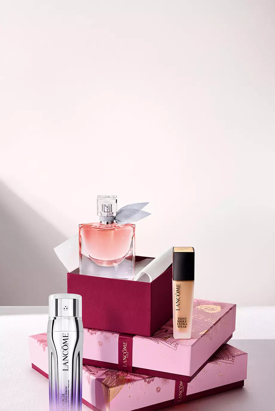Lancome's Renergie Triple Serum, La vie est belle and GTeint Idole Ultra Wear displayed together on a gifting background.
